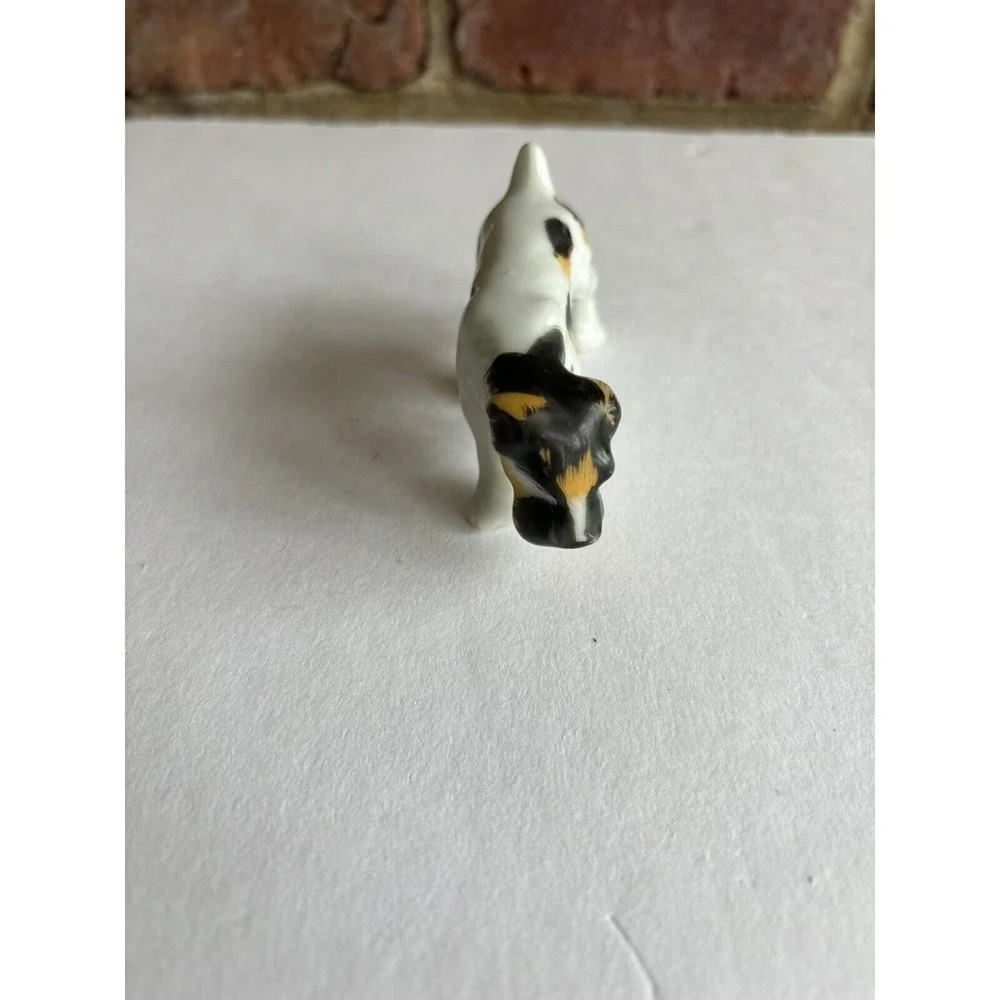 VINTAGE TERRIER/SCHNAUZER DOG FIGURINE JAPAN HAND PAINTED PORCELAIN 3” LENGTH
